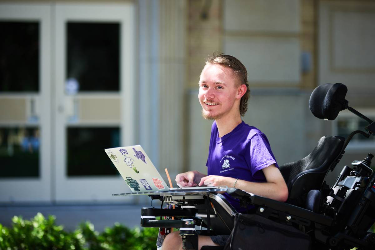 A TCU student outdoors on the first day of classes for the Fall Semester, August 23, 2021. Photo by Andrew Emery