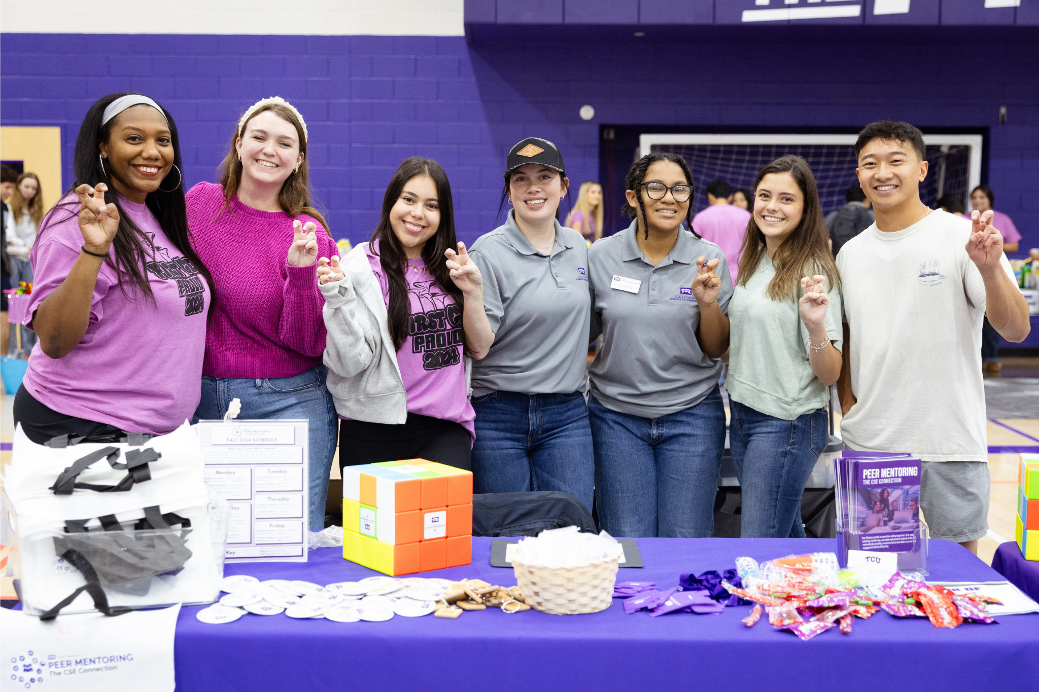 students and staff smiling