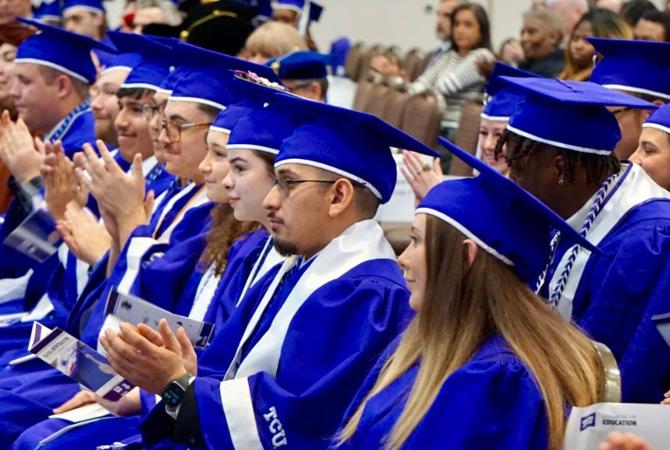 graduates clapping